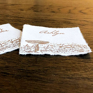 name cards with torn edges on rice paper