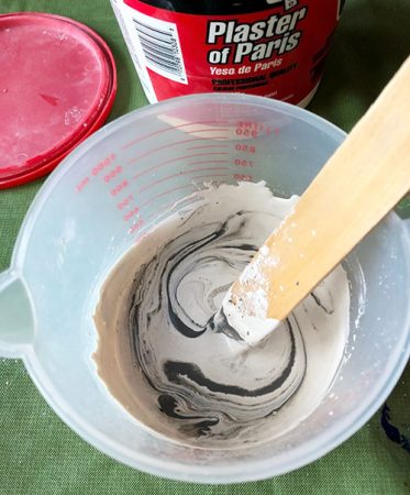 Adding paint to Plaster of Paris