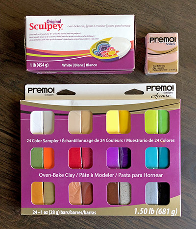 Three packages of Sculpey Polymer Clay