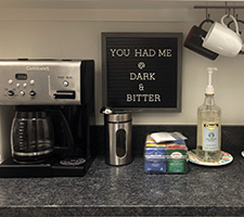 coffee pot with dark and bitter sign