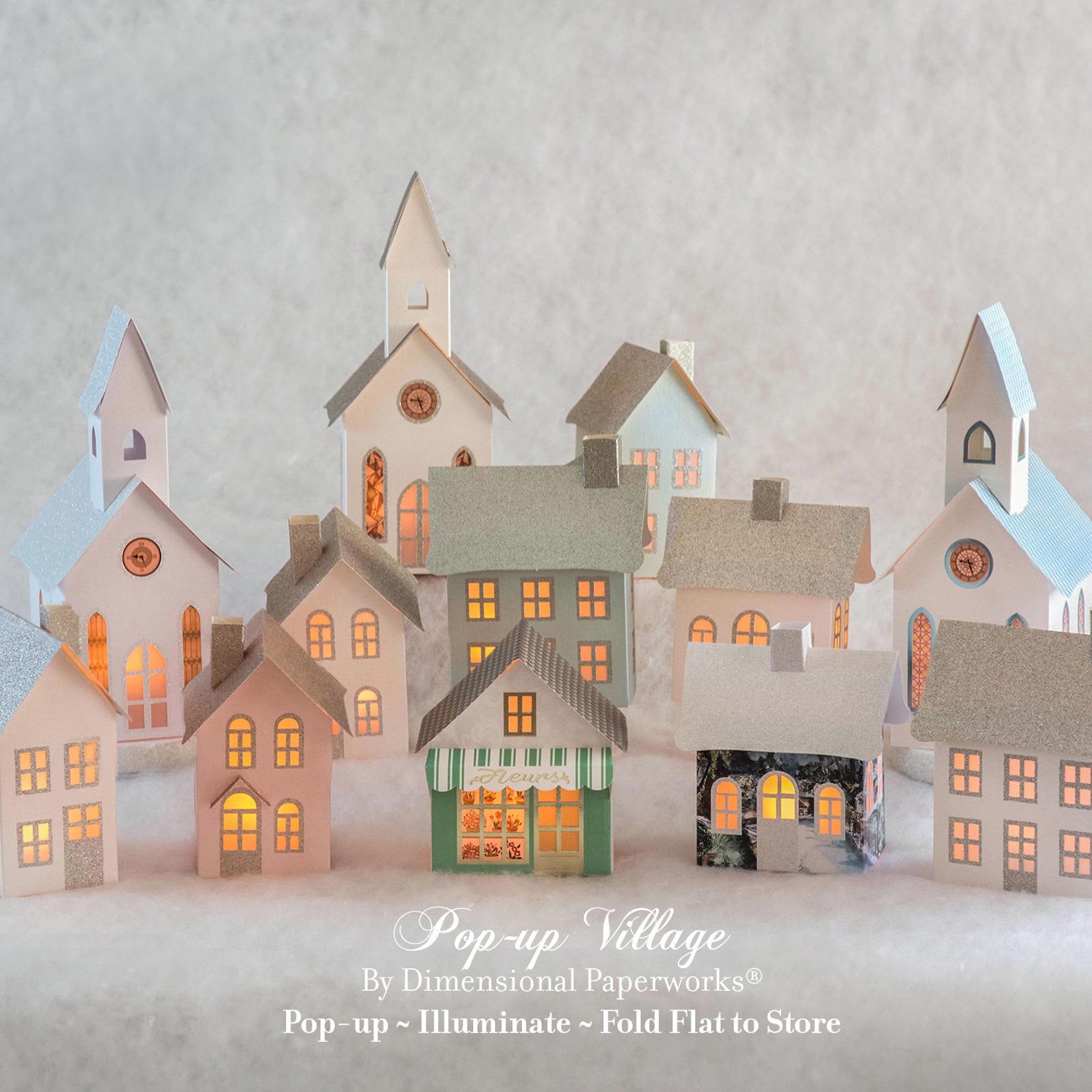 Picture of Pop-Up Houses making up a village. These make great gifts.